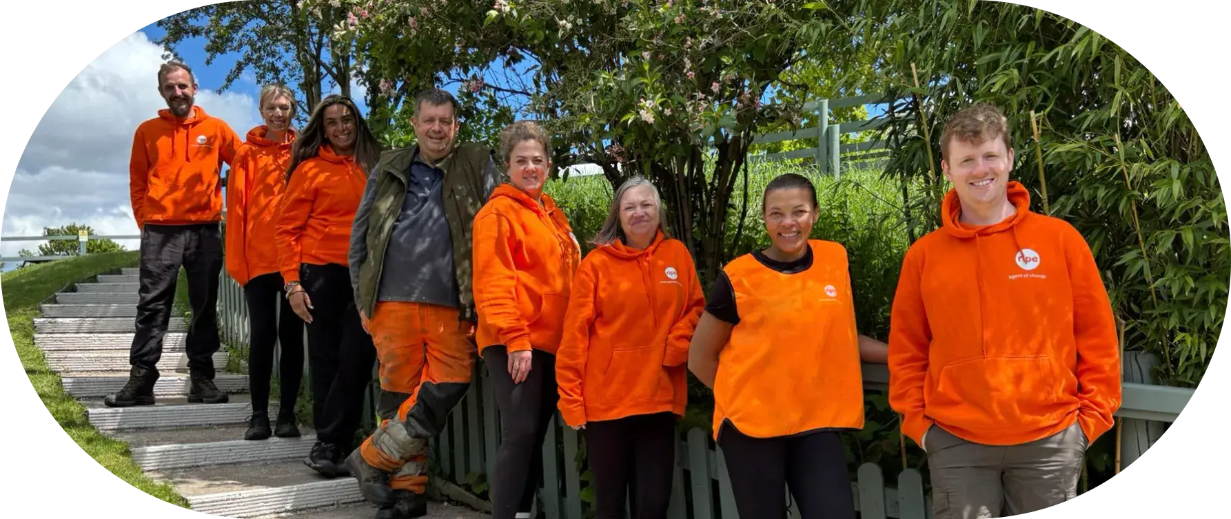 Ripe employees on volunteer day in Ripe orange branded hoodies
