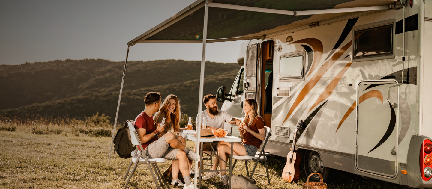 people infront of motorhome