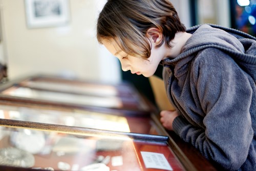 young boy in a museum