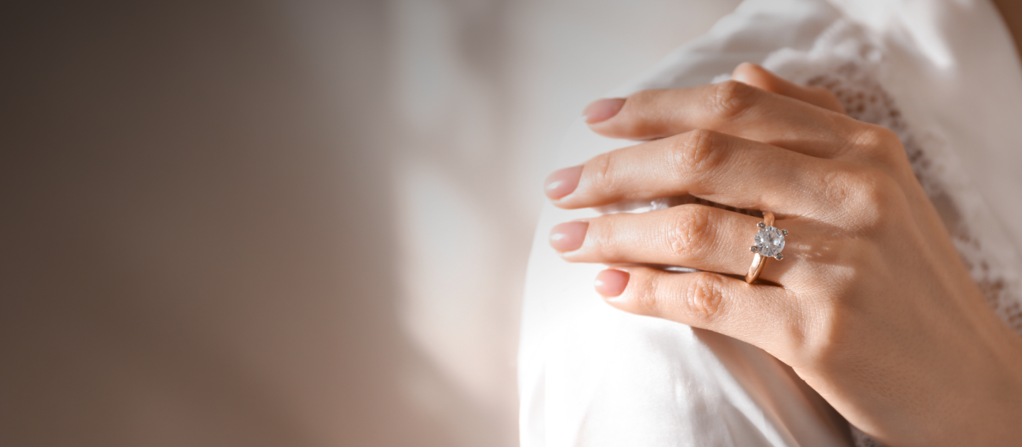 woman's hand with a ring 
