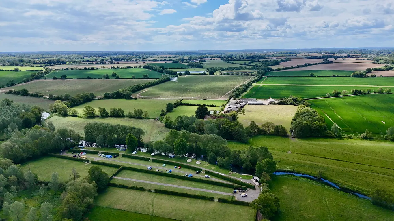 aerial shot of a campsite on a sunny day
