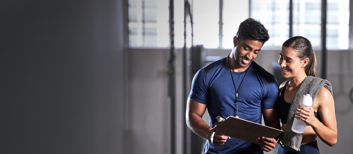 Personal trainer and client
