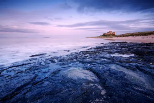 Bamburgh castle beach in winter