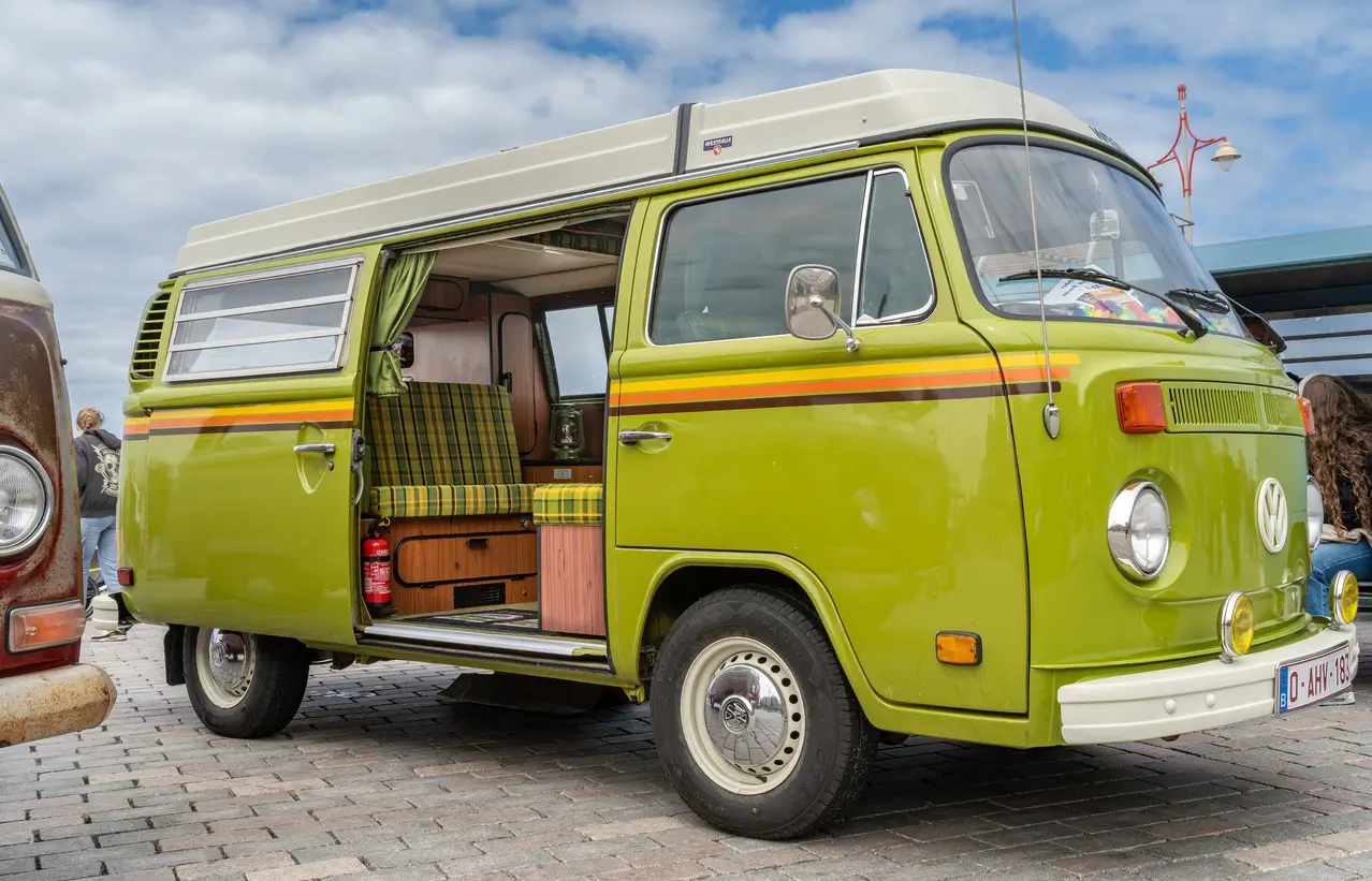 picture of a green classic camper