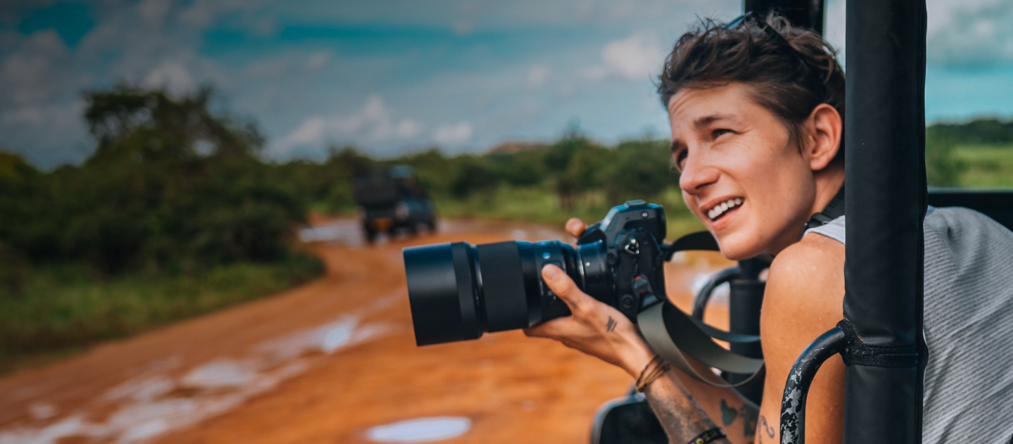 woman holding camera 