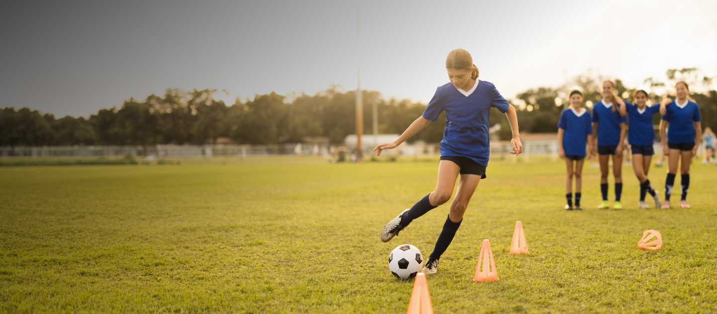A kids team playing football