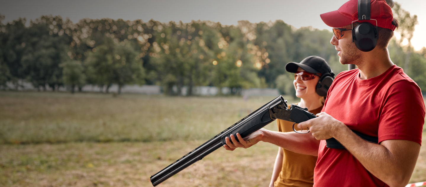 Two people out on a clay pigeon shoot