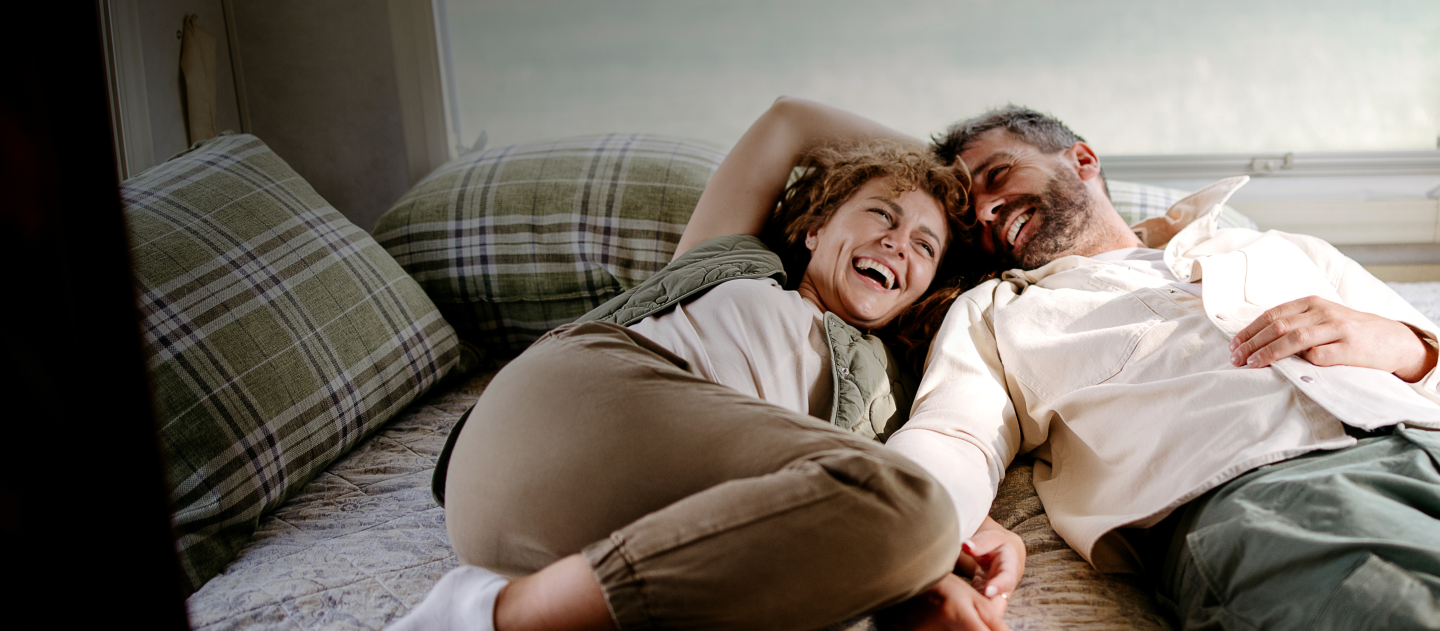 people lying in a caravan