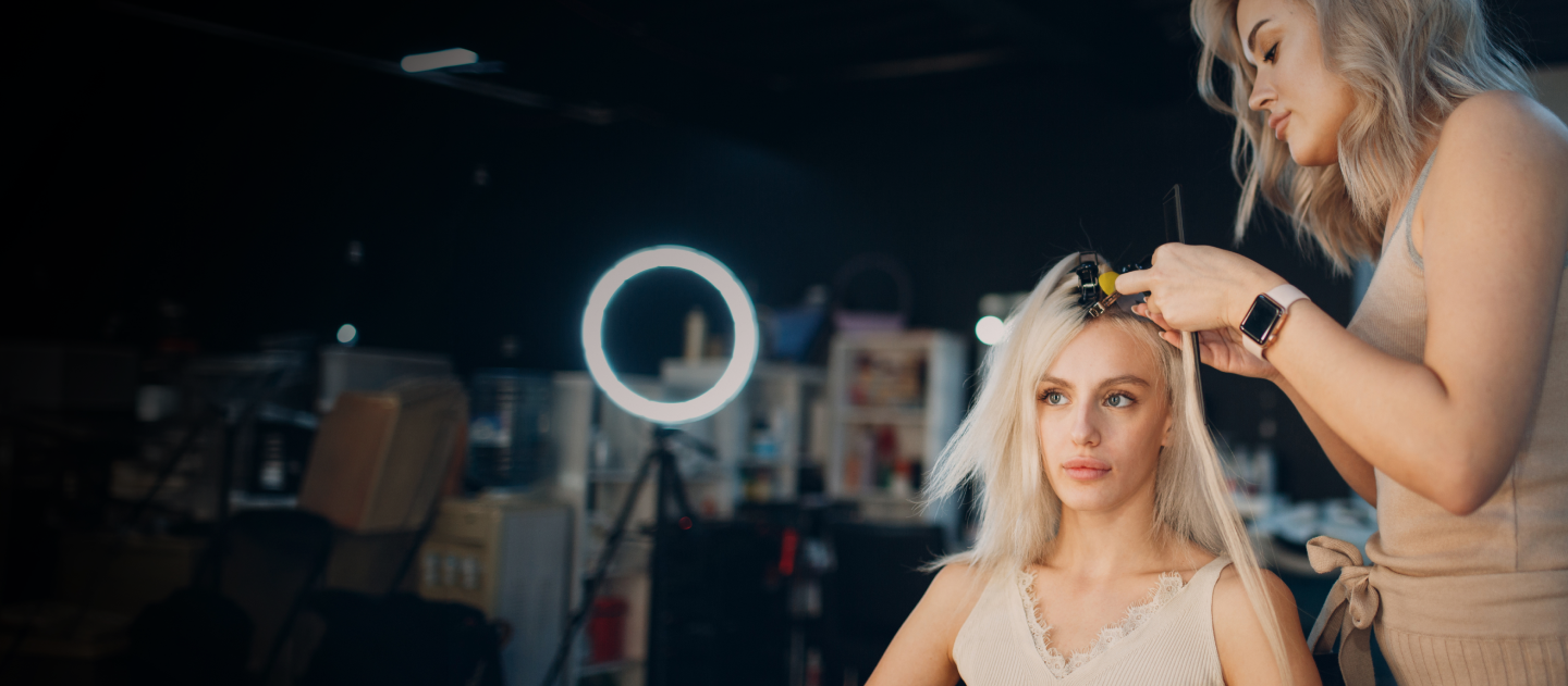 Hairdresser working on a client's hair