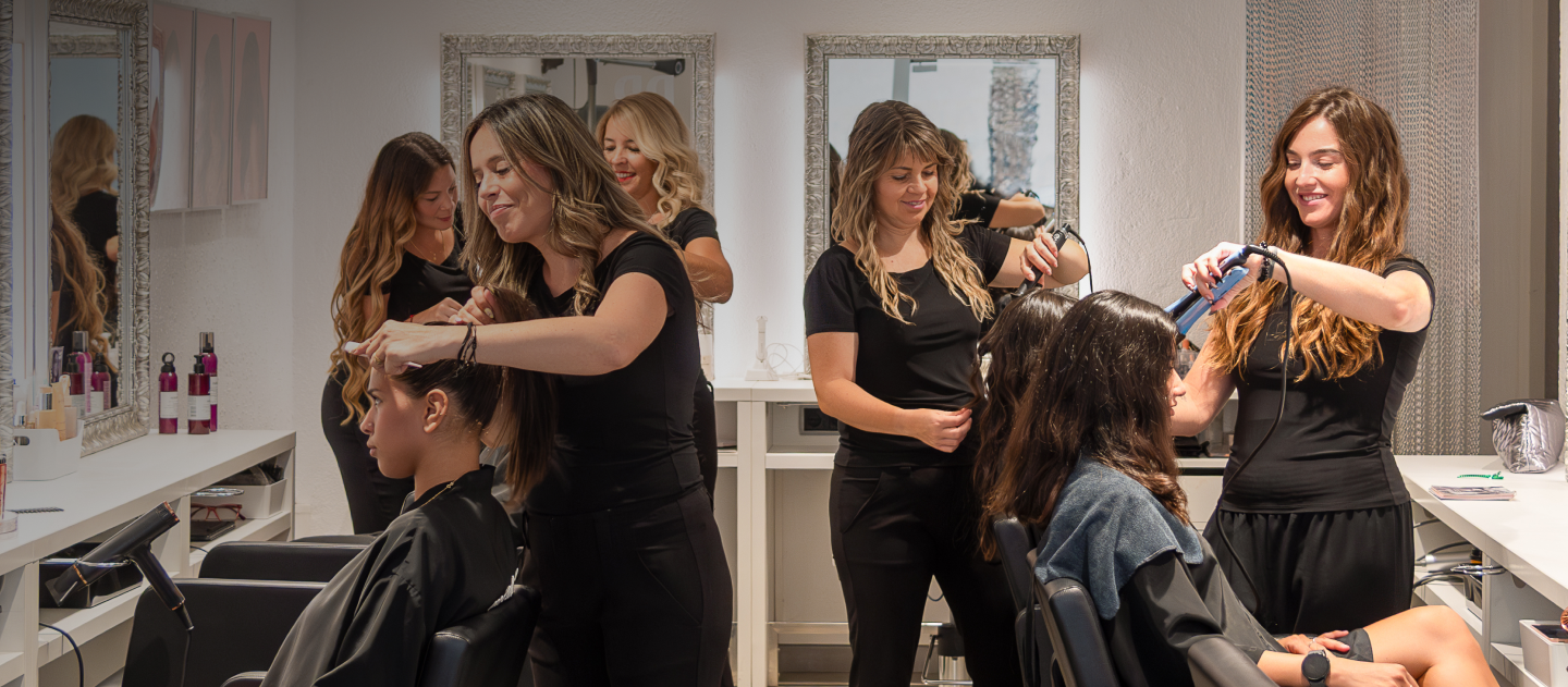 Hairdresser working on a client's hair
