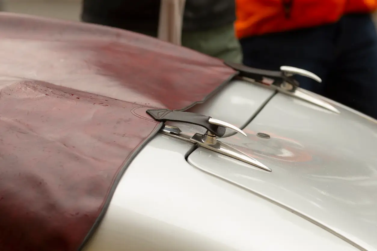 Classic car with a cover on